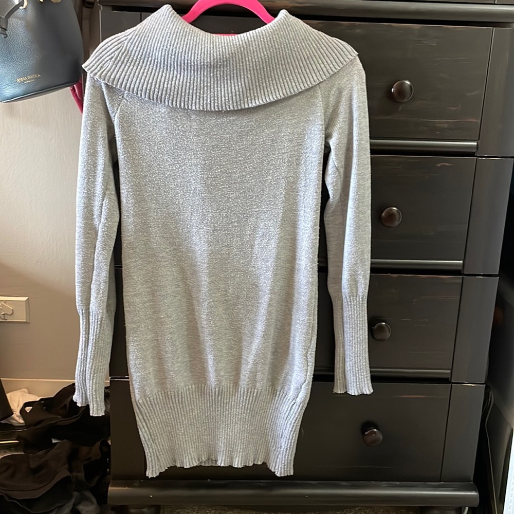 Women’s sweater dress, soft, stretchy and form-fitting.